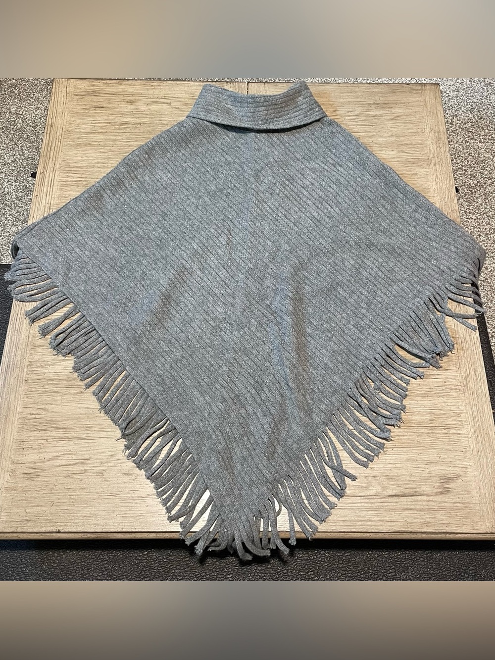 New York & Company knit poncho, gray with fringe. OS